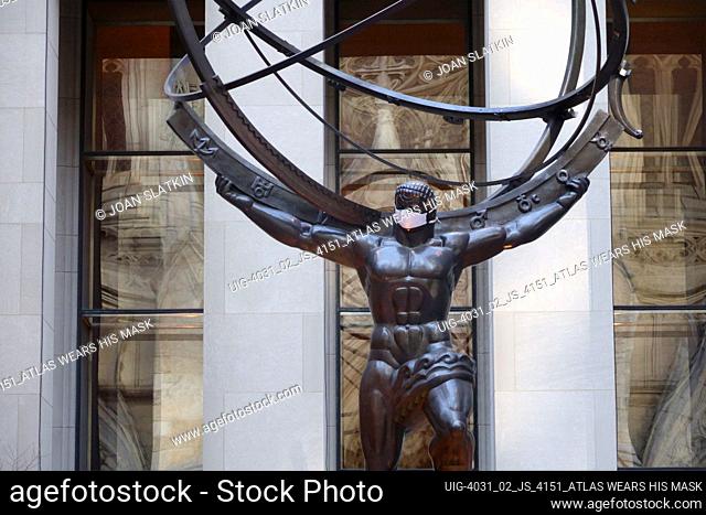 Statue of Atlas wearing face mask, Rockefeller Center, Manhattan, New York